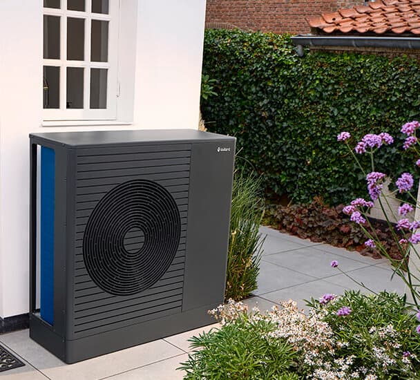 arotherm pro air-to-water heat pump under a window